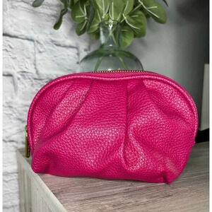 Bareminerals Pink with gold hardware makeup pouch.